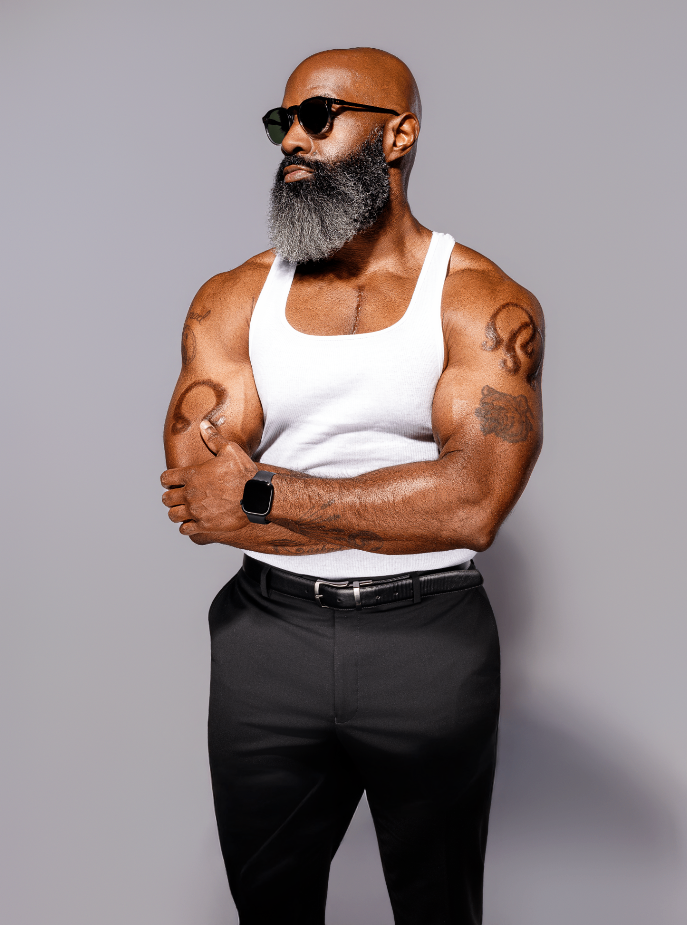 Studio portrait, tank top with tailored trousers